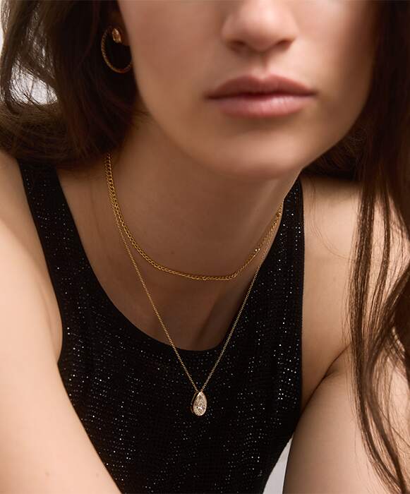 Gold beaded ring with an emerald-cut bezel diamond from the James Allen Collection